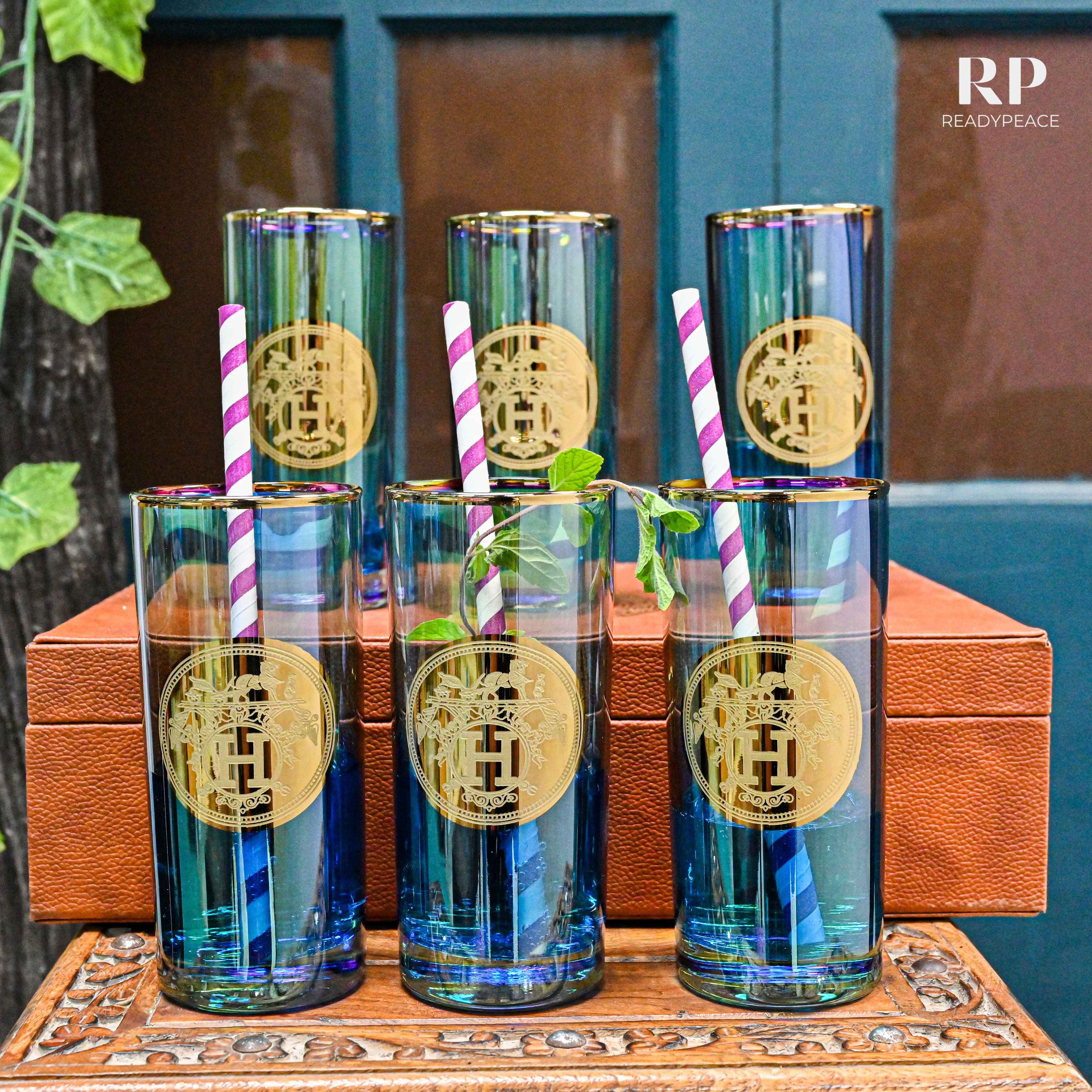 Sheen Hermes Bluish Green Tall Glass with Gold Pantography